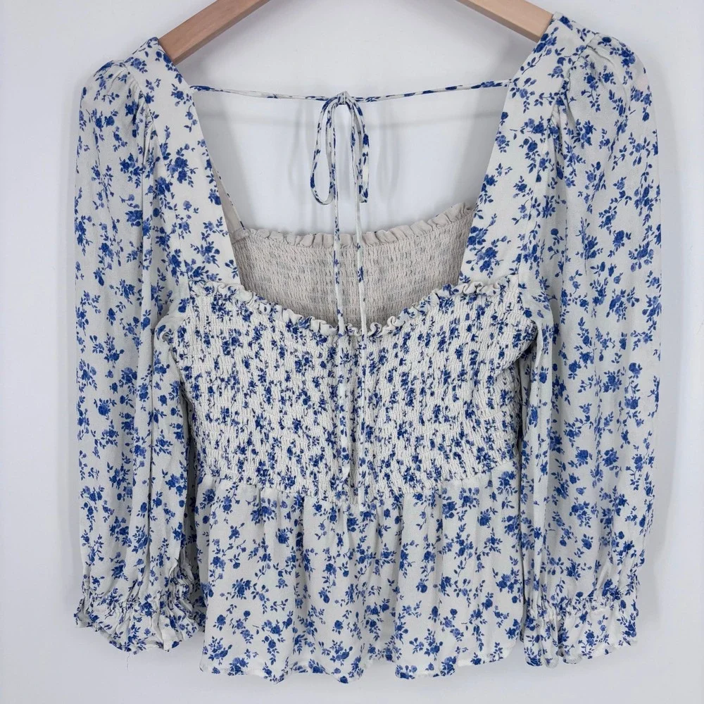 Reformation Braelyn Floral Top Womens L Blue Smocked Peplum Tie Back Blouse